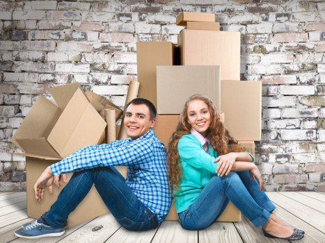 Packed boxes and furniture in a flat move quote example