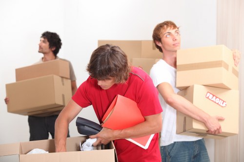 Packed moving boxes and furniture ready for house removals in Crystal Palace