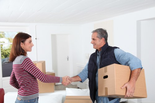 Local movers loading furniture for a flat move in Crystal Palace
