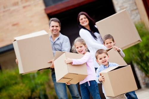 Sorting cardboard and reusable furniture for recycling and donation