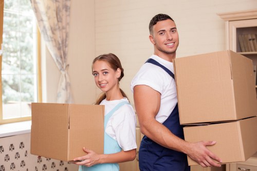 Loading boxes and home items into a moving van