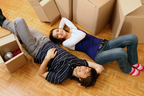 Workstations and office furniture being prepared for a business move